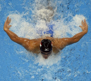 Olympic swimmer Nathan Adrian in a 100m butterfly competition