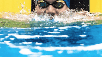 Olympic medalist Dana Vollmer trains to swim in competition while pregnant