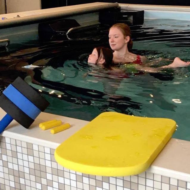A one-on-one learn-to-swim lesson in the Dual Propulsion Endless Pool at Wise Physical Therapy and Sports Medicine